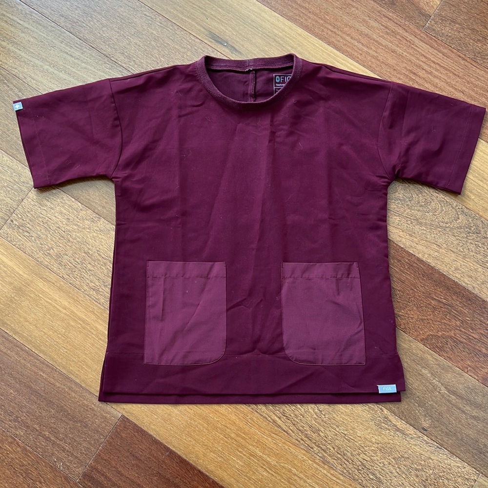 burgundy two-pocket scrub top